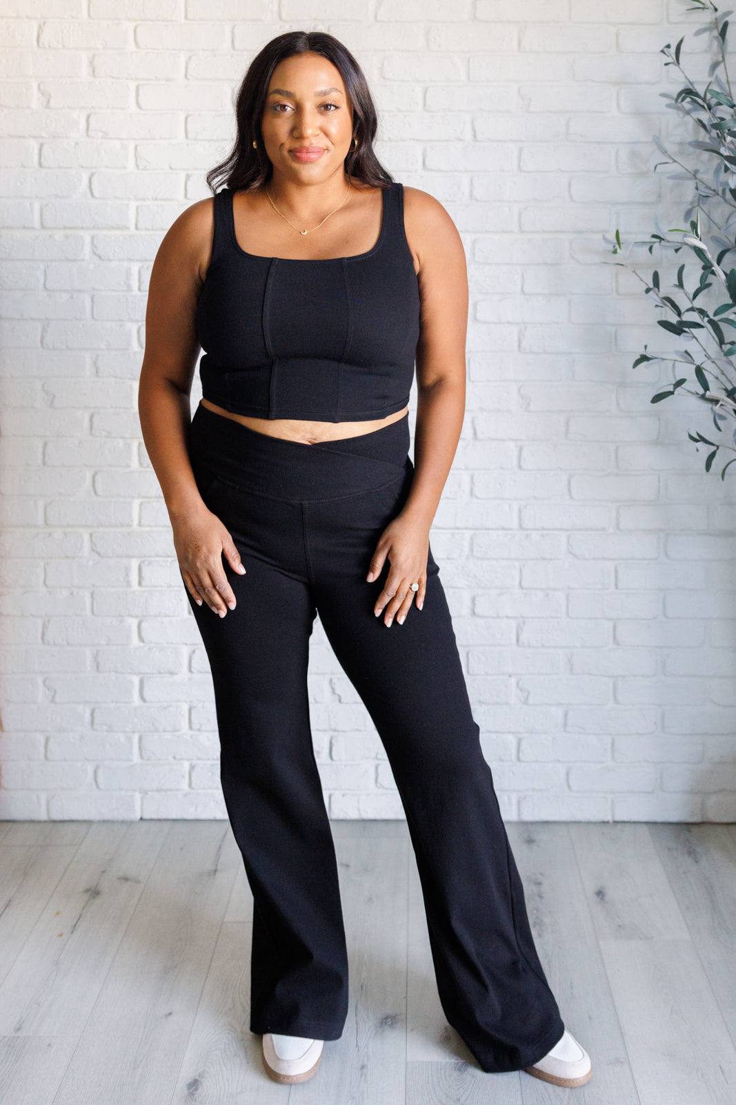 Building Habits Twill Flared Crossover Waist Pant in Black-Bottoms-Villari Chic, women's online fashion boutique in Severna, Maryland