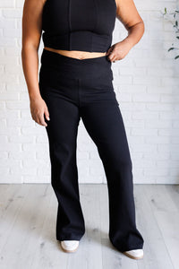 Building Habits Twill Flared Crossover Waist Pant in Black-Bottoms-Villari Chic, women's online fashion boutique in Severna, Maryland