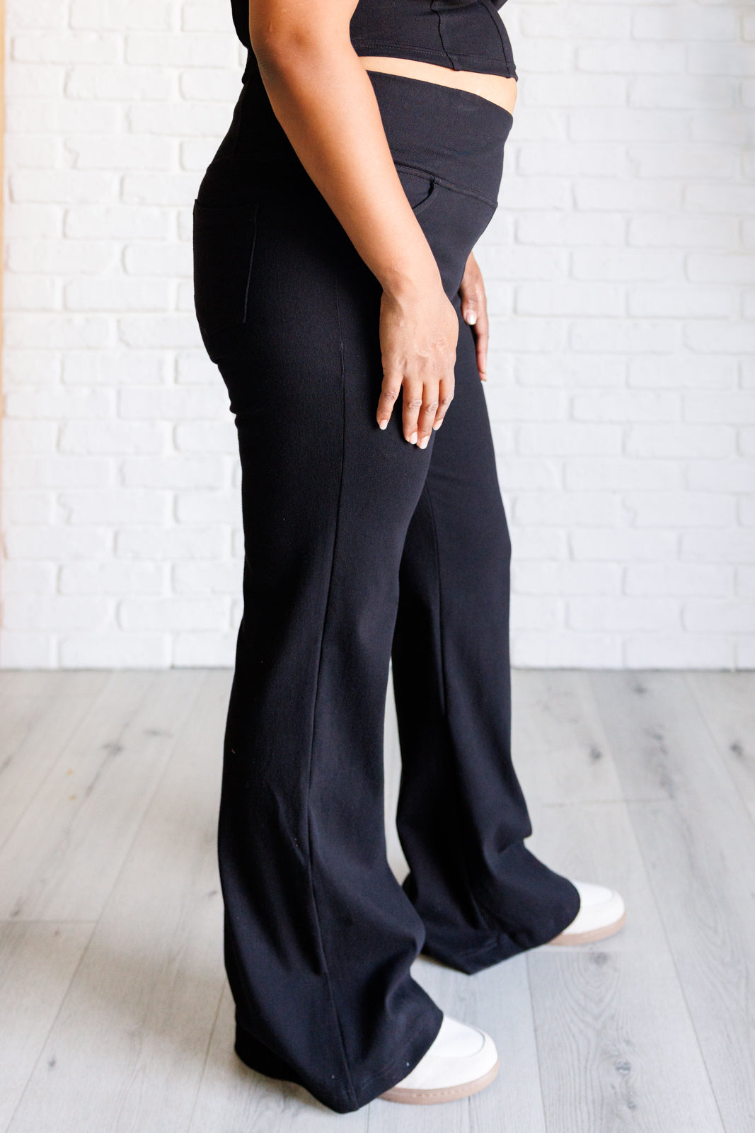 Building Habits Twill Flared Crossover Waist Pant in Black-Bottoms-Villari Chic, women's online fashion boutique in Severna, Maryland