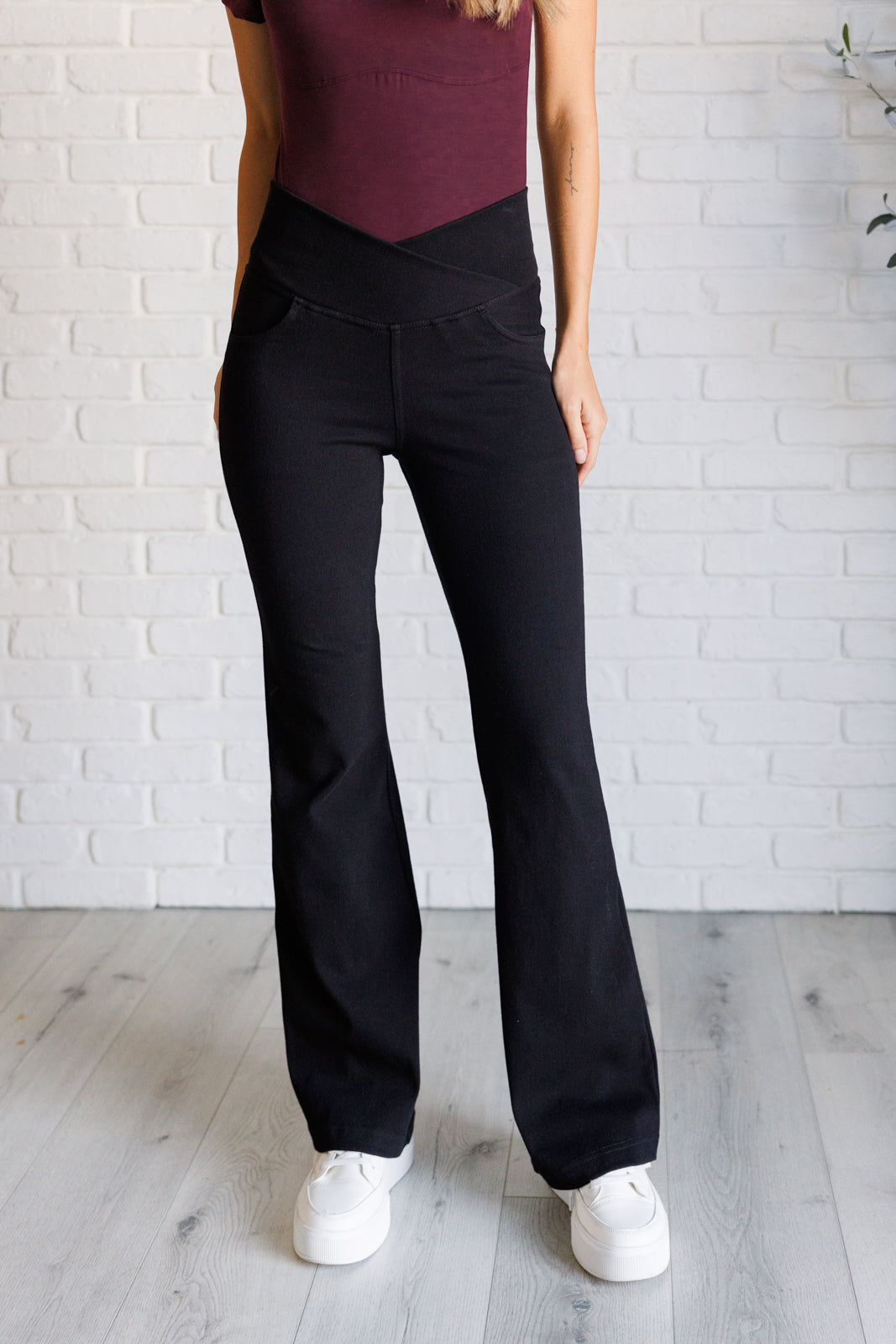 Building Habits Twill Flared Crossover Waist Pant in Black-Bottoms-Villari Chic, women's online fashion boutique in Severna, Maryland