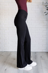 Building Habits Twill Flared Crossover Waist Pant in Black-Bottoms-Villari Chic, women's online fashion boutique in Severna, Maryland