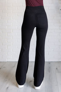 Building Habits Twill Flared Crossover Waist Pant in Black-Bottoms-Villari Chic, women's online fashion boutique in Severna, Maryland