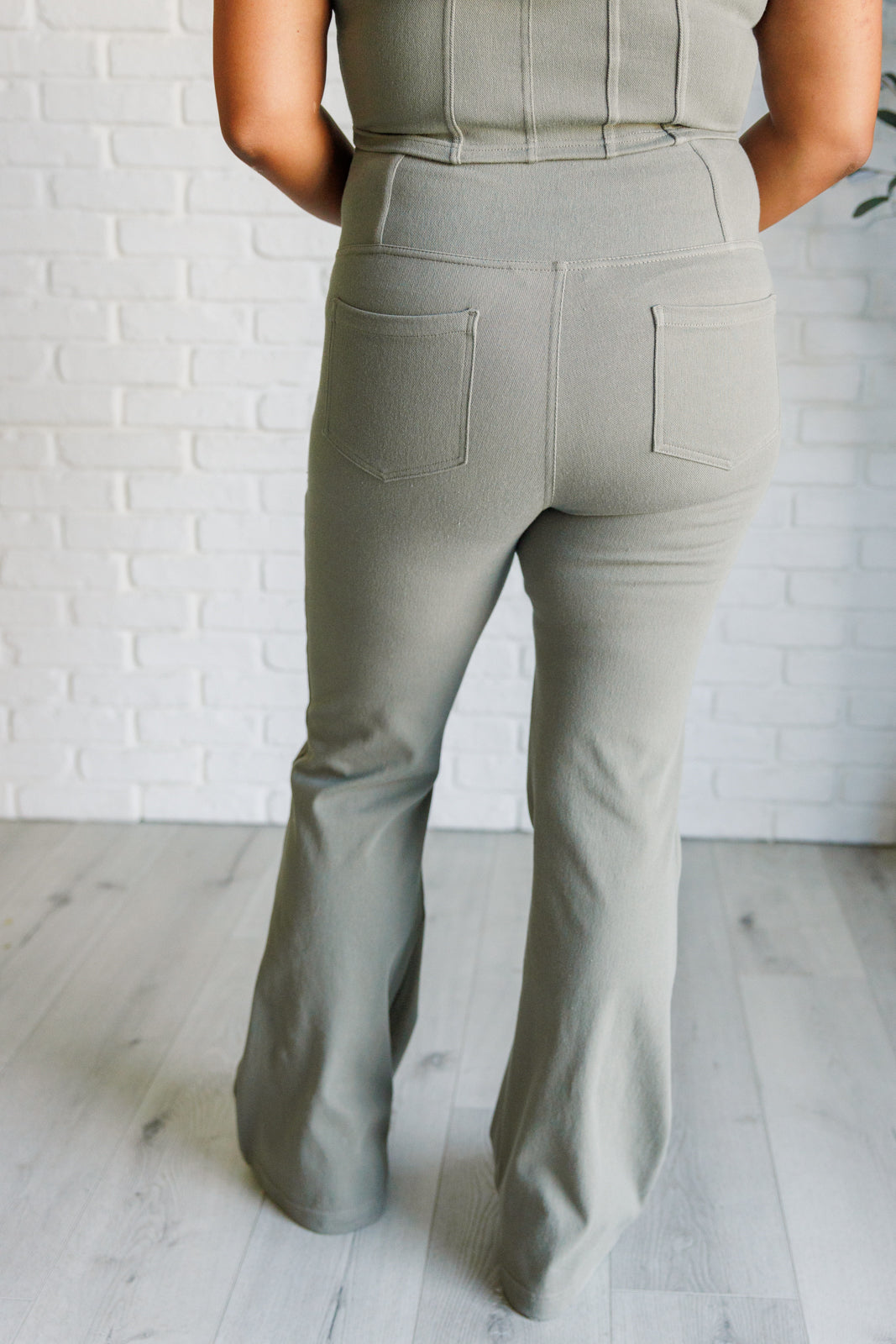 Building Habits Twill Flared Crossover Waist Pant in Dusty Olive-Bottoms-Villari Chic, women's online fashion boutique in Severna, Maryland