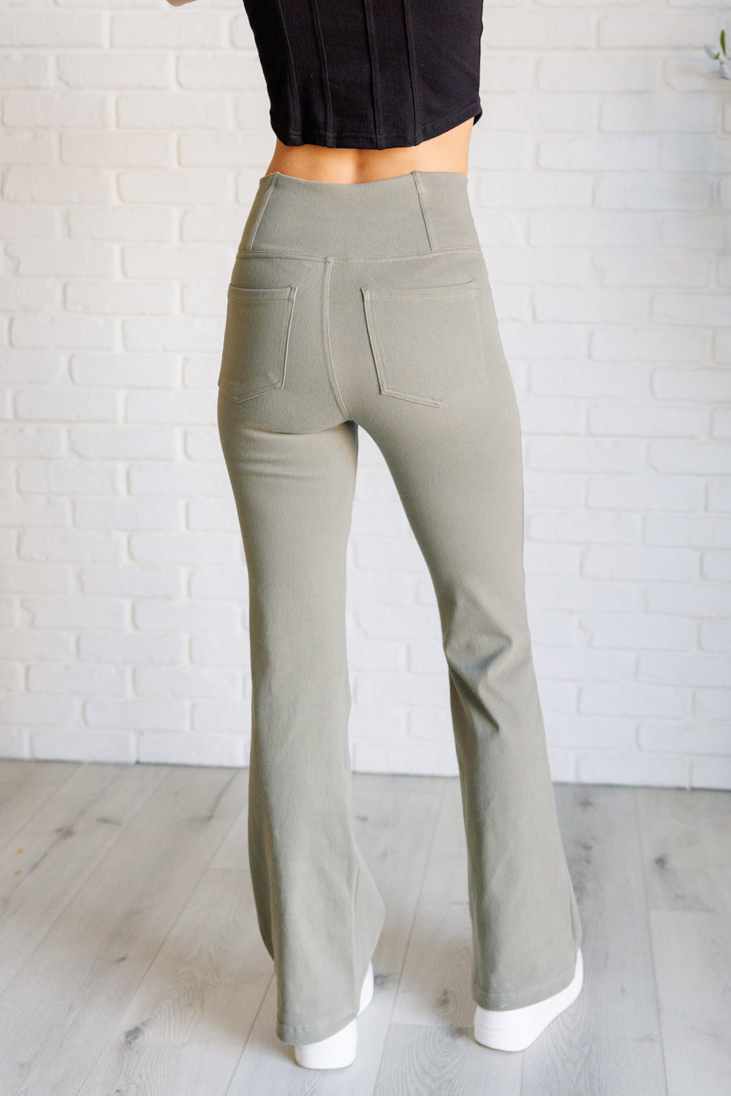 Building Habits Twill Flared Crossover Waist Pant in Dusty Olive-Bottoms-Villari Chic, women's online fashion boutique in Severna, Maryland