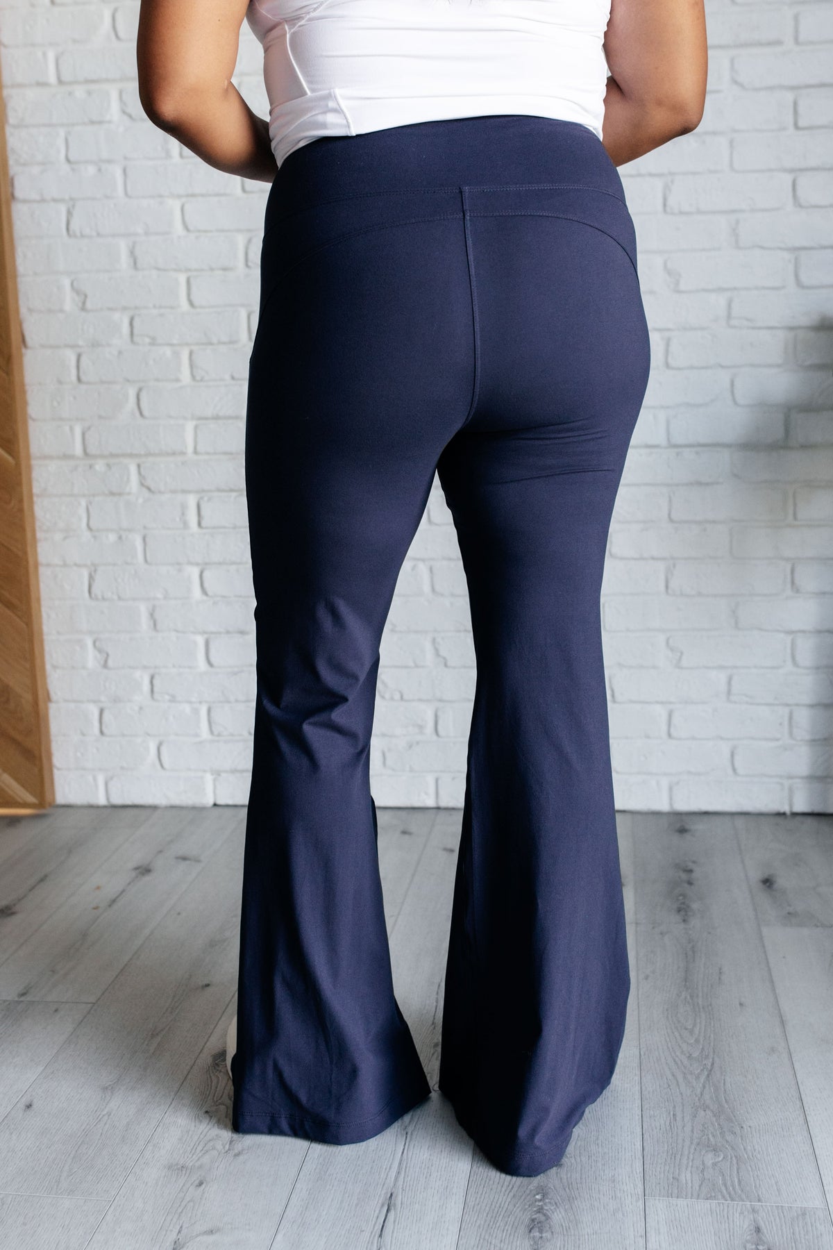 Stamina Stride Flare Leggings in Navy-Athleisure-Villari Chic, women's online fashion boutique in Severna, Maryland